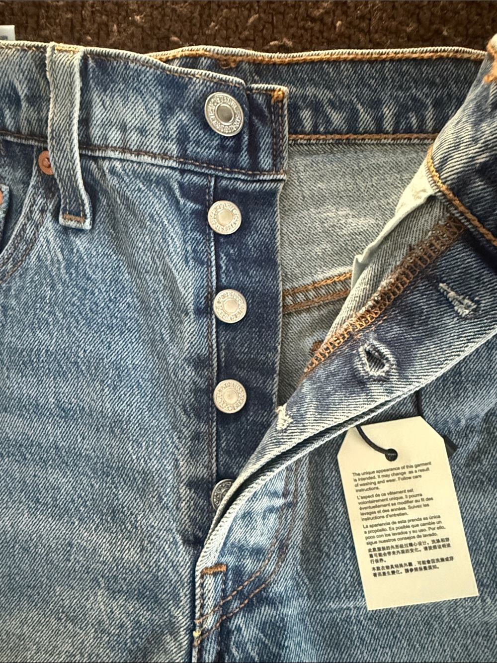 Levi's Light Blue Distressed Cutoff Denim Shorts - Picture 3 of 5